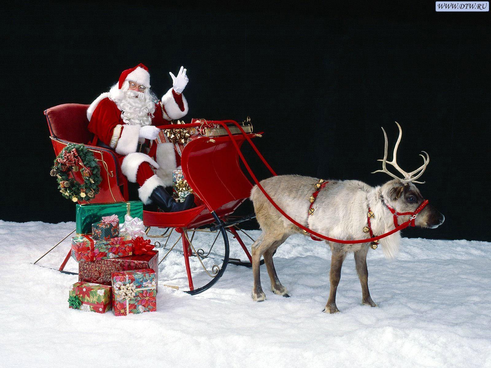 Photos Christmas sledge Santa Claus Holidays 600x450 New year Sled sleigh