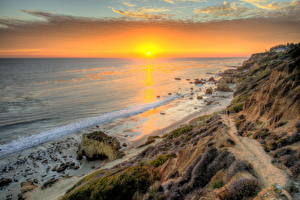 Картинки Побережье США Море Рассвет и закат Пляже Облачно Горизонта HDRI Калифорния Малибу Солнца Природа